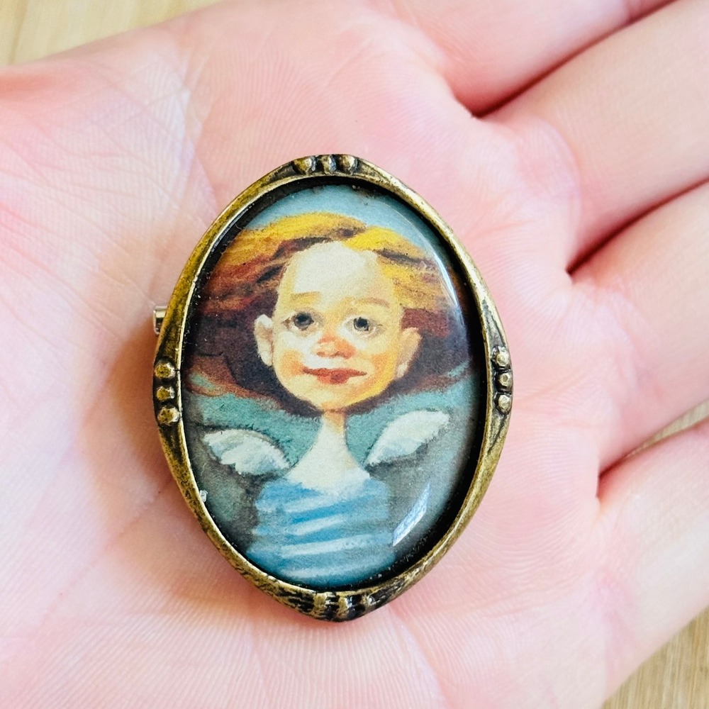 Ella Silvan Angel Smile Brooch Pin Signed Wearable Art Portrait Oval Framed
